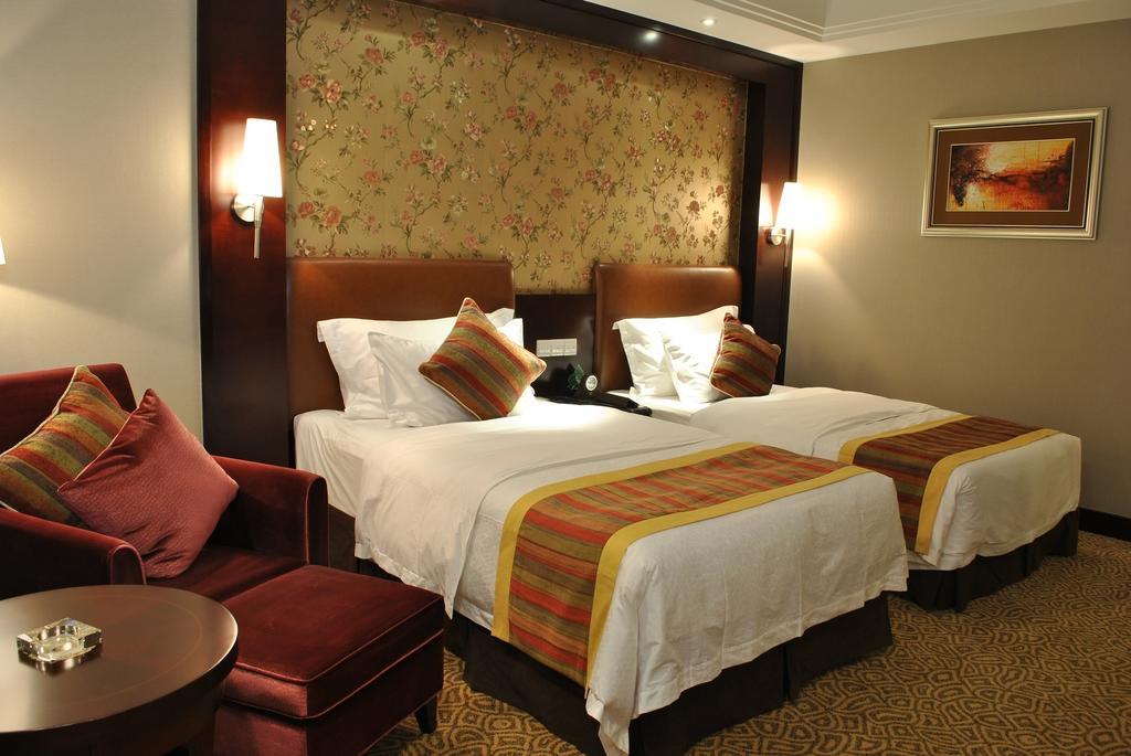 Qingyuan International Hotel Zimmer foto
