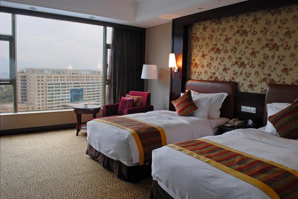 Qingyuan International Hotel Zimmer foto